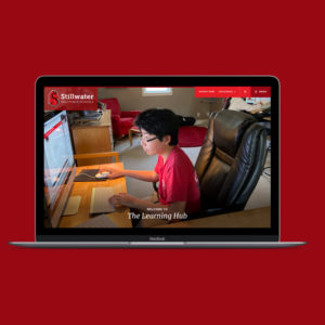 stillwater learning hub website on a laptop