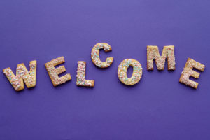 Flat Lay of Letter Shaped Cookies spelling Welcome