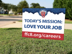 yard sign that reads Today's Mission: Love Your Job