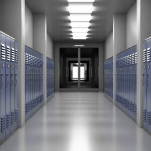 An empty school hallway, implying coldness and emotional distance. An emotional connection is needed to make this building feel welcoming and fun.